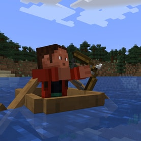 Noor is aiming a bow while sitting in a boat on a lake.