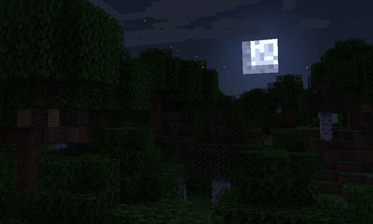 The moon rises over a dark, foreboding forest